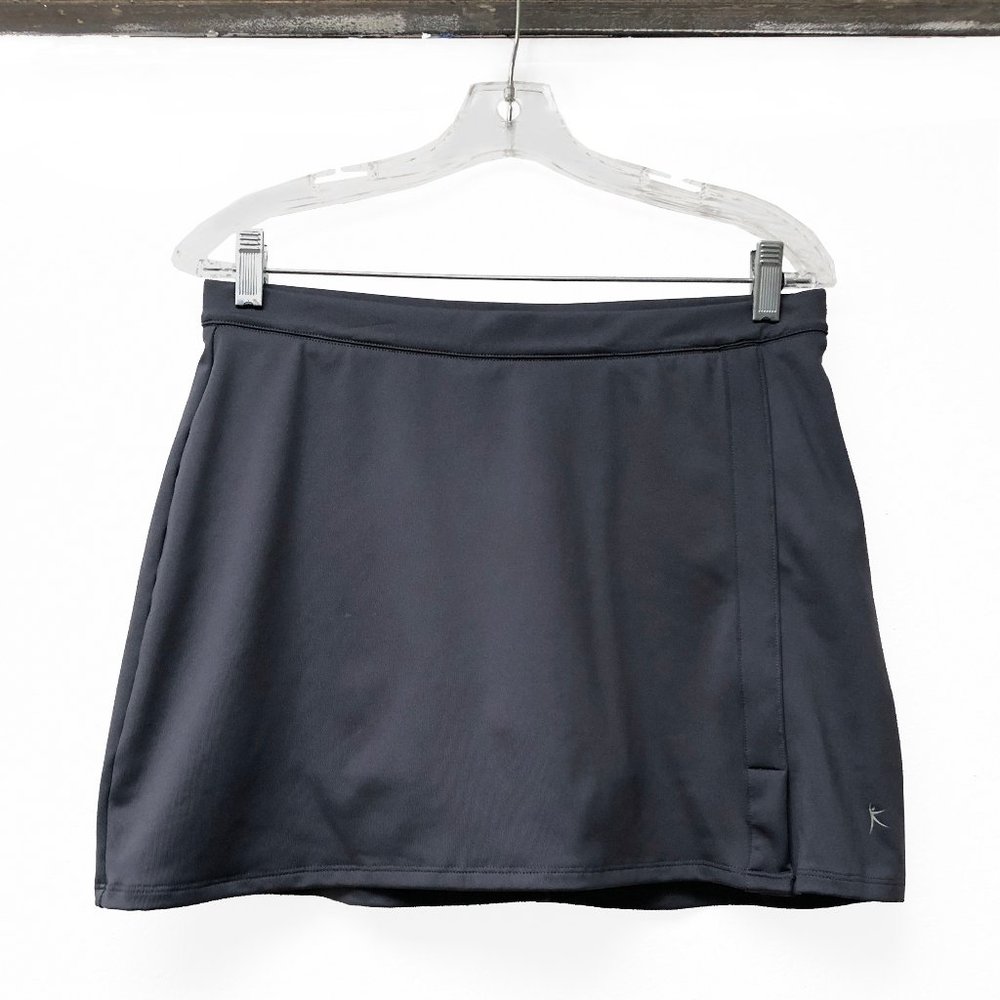 Danskin athletic tennis skirt with built in shorts and pocket for a ball